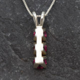 Gorgeous Created Ruby Pendant in 925 Sterling Silver, a chic three-stone design perfect for celebrating July birthdays and special moments.