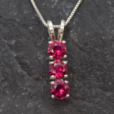 Created Ruby Pendant made in 925 Sterling Silver with Round Created Red Ruby in Three-Stone setting, July Birthstone gift idea, symbolizes nobility, purity, and passion, ideal for everyday wear and perfect for birthday gifting and special occasions.