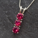 Stunning 925 Sterling Silver Created Ruby Pendant, featuring a three-stone design, ideal for everyday elegance and July birthdays.