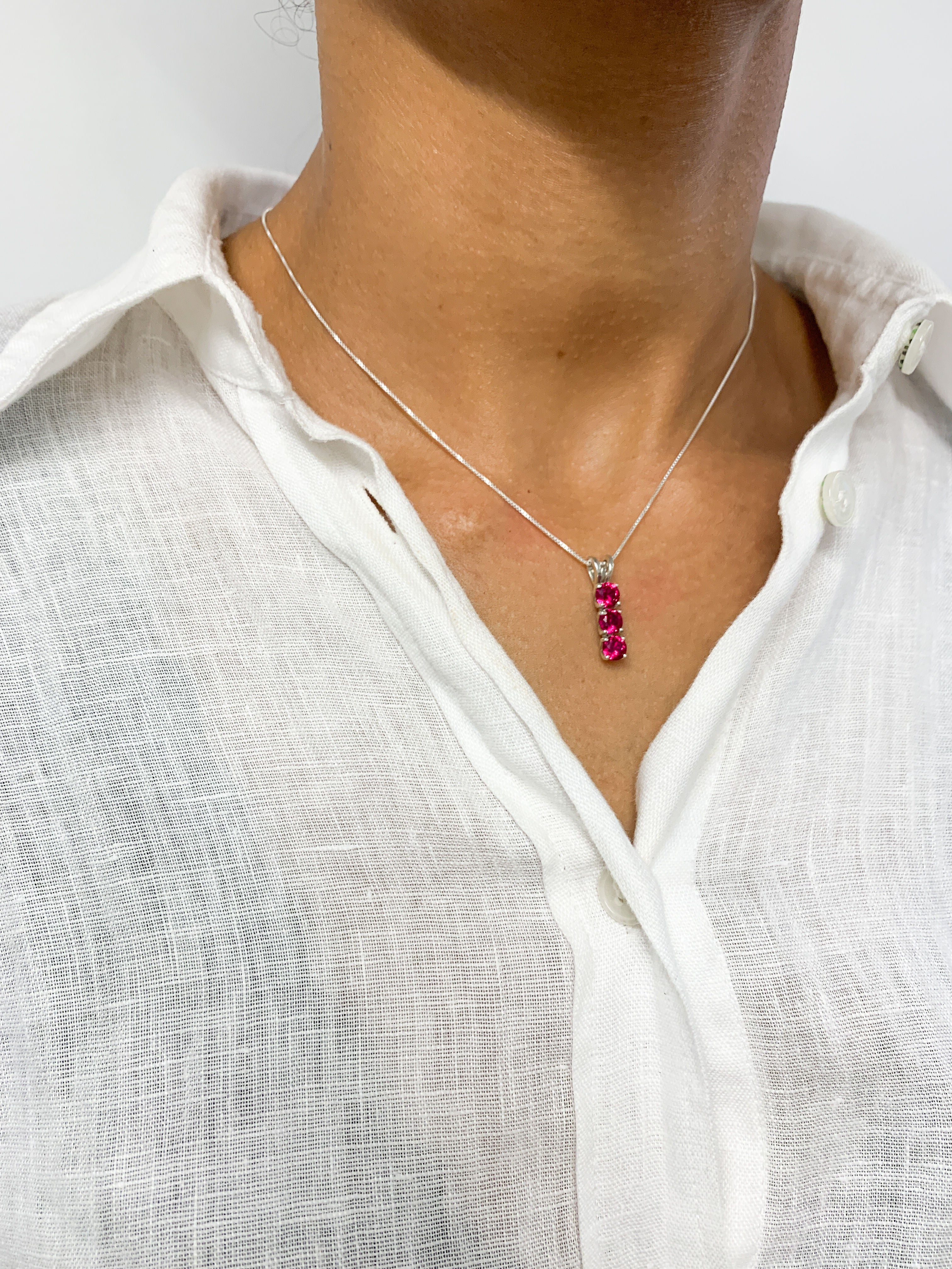 Beautiful Created Ruby Pendant in 925 Sterling Silver, a stunning July birthstone piece symbolizing passion and elegance.