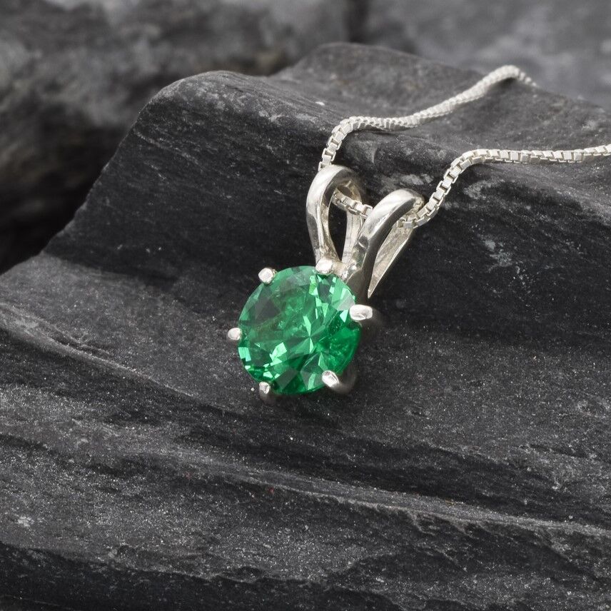 Beautiful Created Emerald Pendant in 925 Sterling Silver, a versatile piece perfect for celebrating May birthdays and special moments.