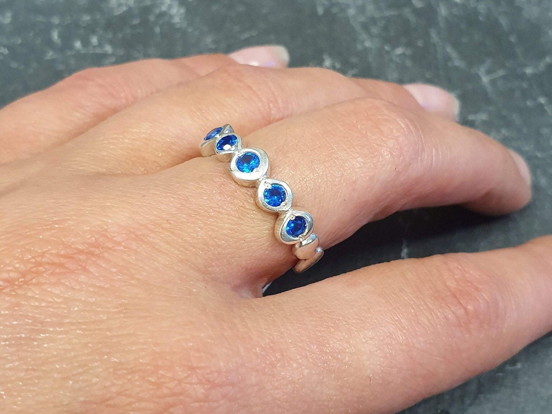 Created Sapphire Ring in 925 Sterling Silver, featuring a blue sapphire, symbolizes sincerity, for everyday wear and birthdays.