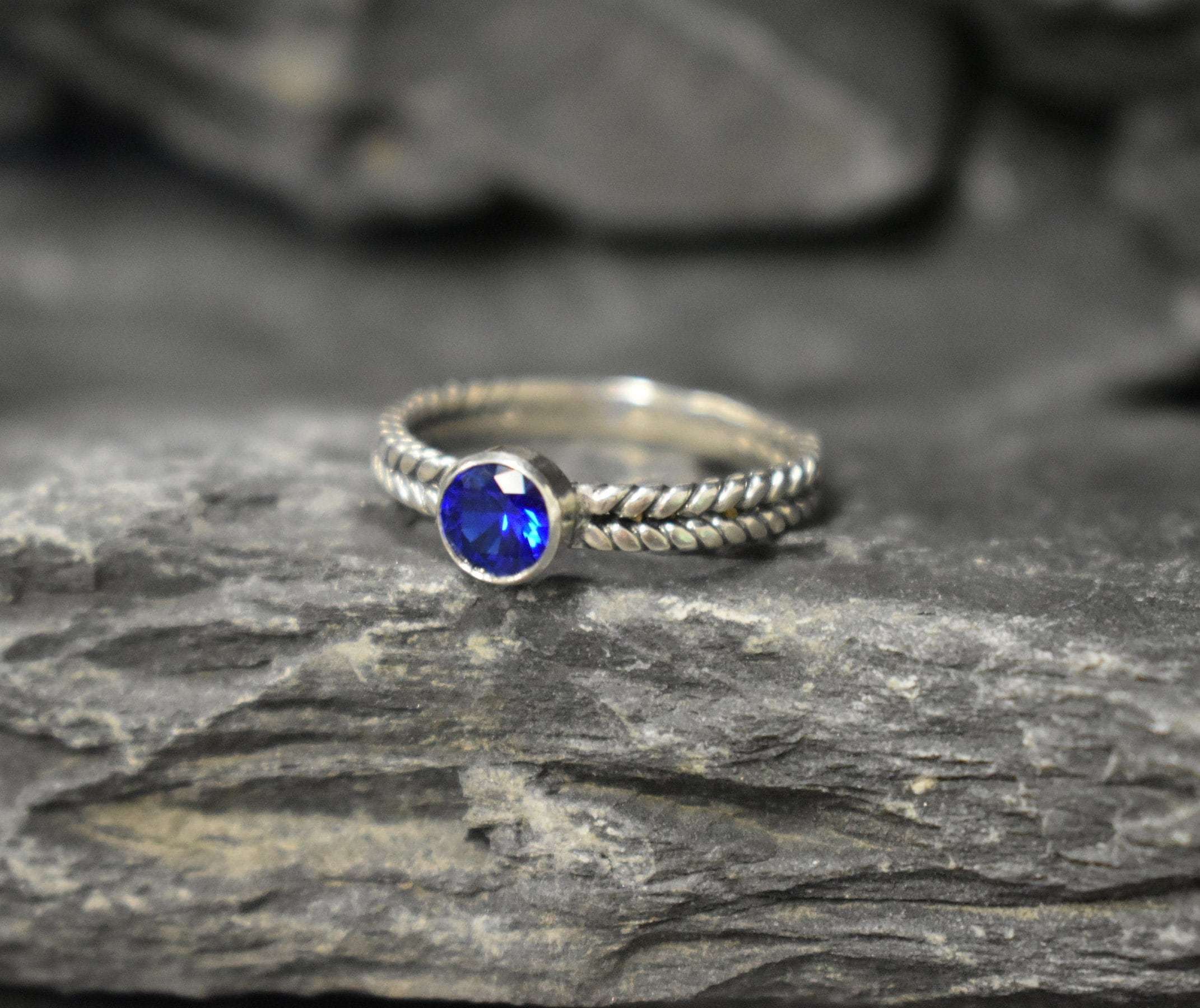 Created Sapphire Ring made in 925 Sterling Silver with Round Created Blue Sapphire in Bezel setting, September Birthstone gift idea, symbolizes sincerity, truth, and faithfulness, ideal for everyday wear and perfect for birthday gifting and special occasions.