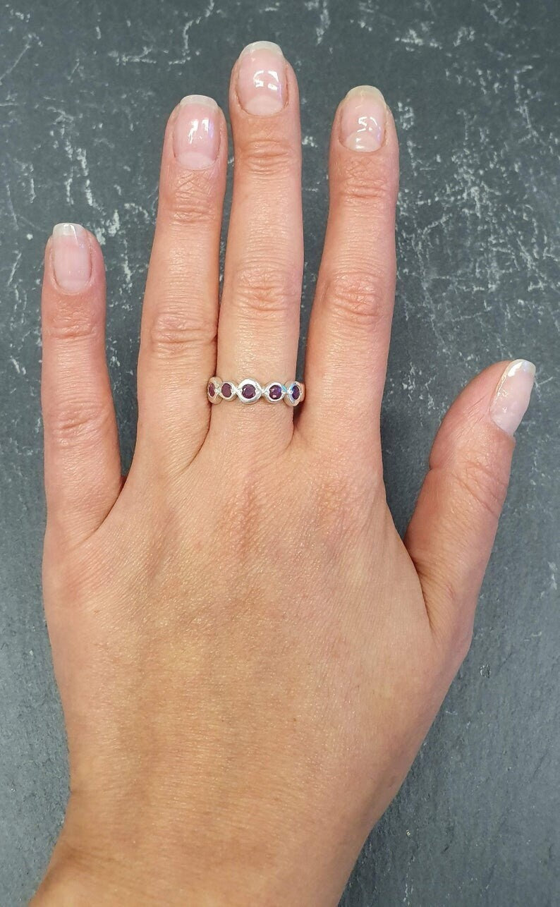 Elegant 925 Sterling Silver ring featuring a round Created Red Ruby, perfect for July birthdays and special occasions.