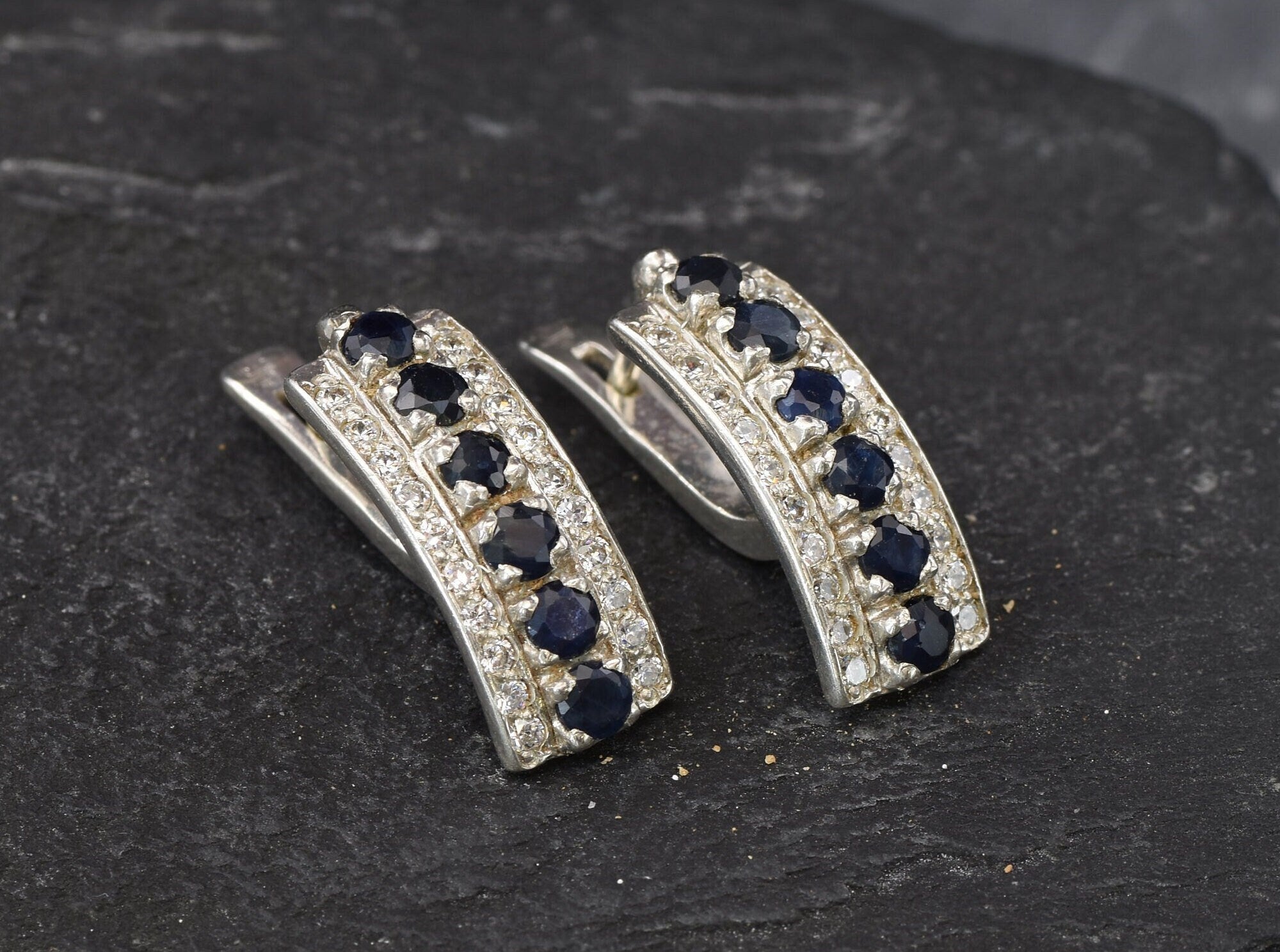 Natural Sapphire Earrings made in 925 Sterling Silver with Round Natural Blue Sapphire in Channel-Set setting, September Birthstone gift idea, symbolizes sincerity, truth, and faithfulness, ideal for everyday wear and perfect for birthday gifting and special occasions.