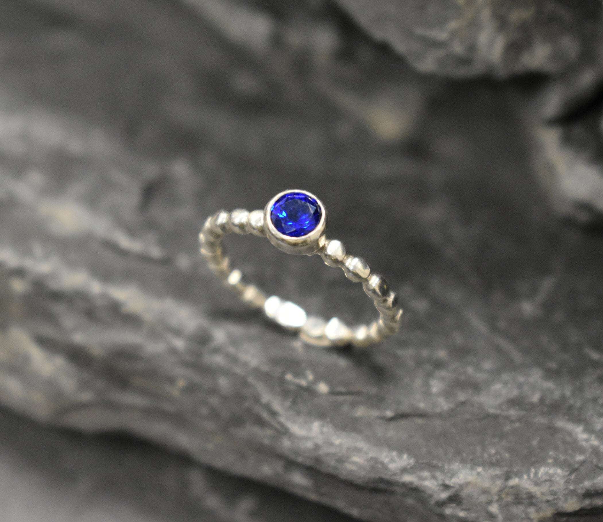 Created Sapphire Ring made in 925 Sterling Silver with Round Created Blue Sapphire in Bezel setting, September Birthstone gift idea, symbolizes sincerity, truth, and faithfulness, ideal for everyday wear and perfect for birthday gifting and special occasions.