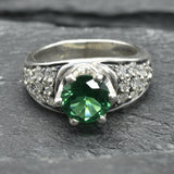 Elegant 925 Sterling Silver ring with cluster-set round created green emerald, ideal for May birthdays and special occasions.