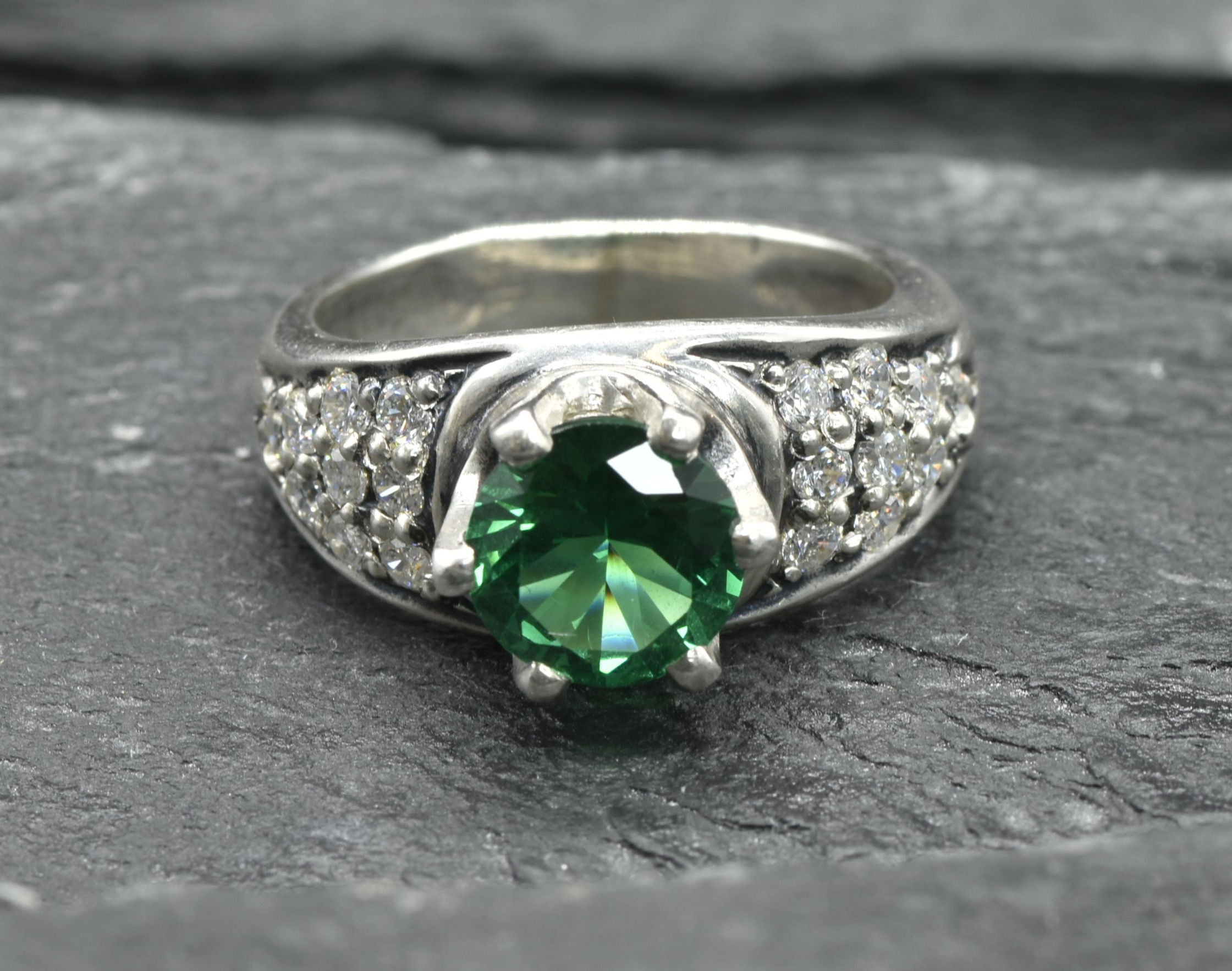 Elegant 925 Sterling Silver ring with cluster-set round created green emerald, ideal for May birthdays and special occasions.