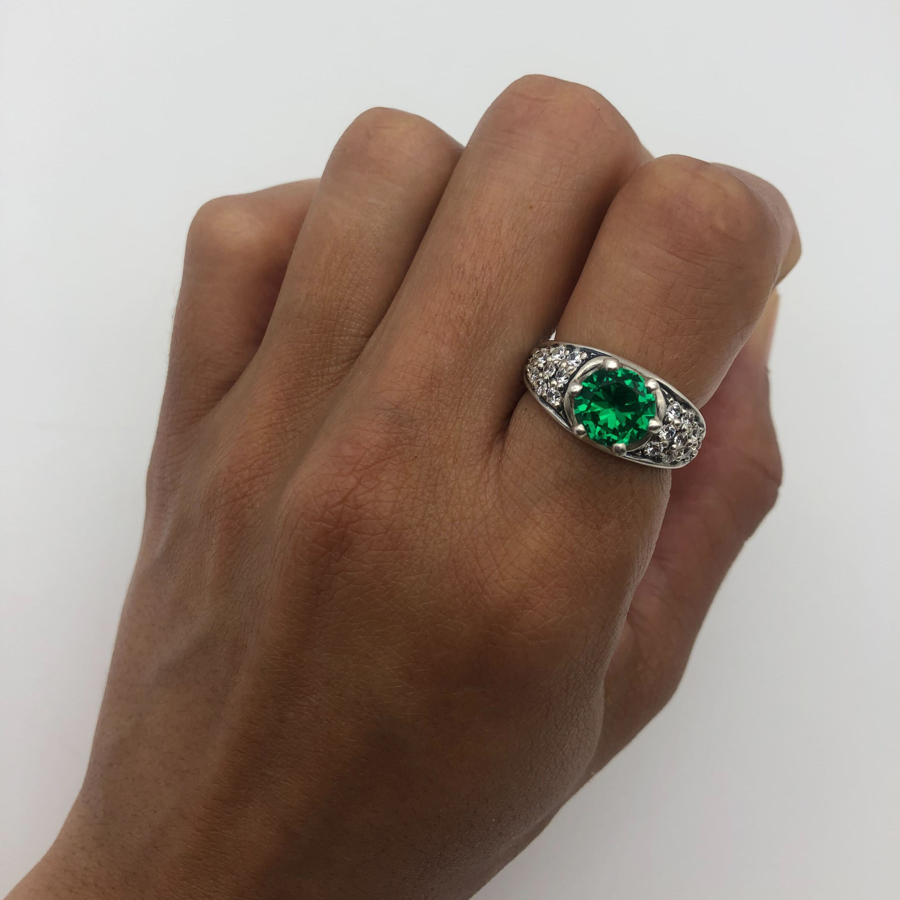 Crafted 925 Sterling Silver Emerald Ring, featuring a round created green emerald in a stunning cluster setting.