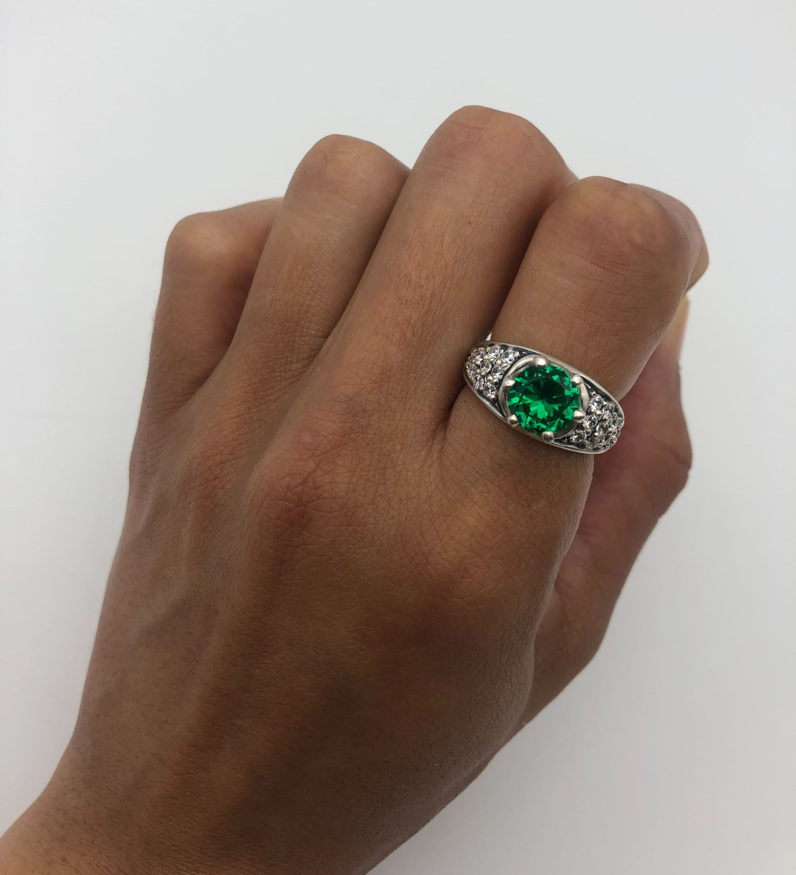 Crafted 925 Sterling Silver Emerald Ring, featuring a round created green emerald in a stunning cluster setting.