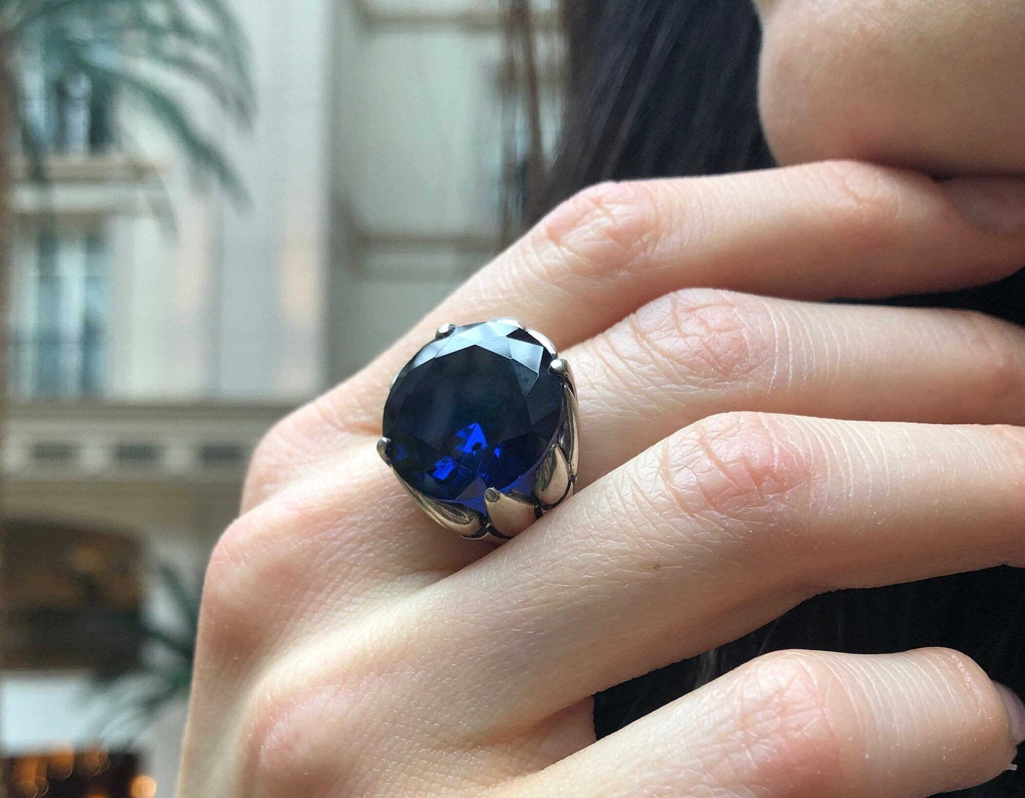 Elegant 925 Sterling Silver ring featuring a round Created Blue Sapphire, perfect for birthdays and special occasions.