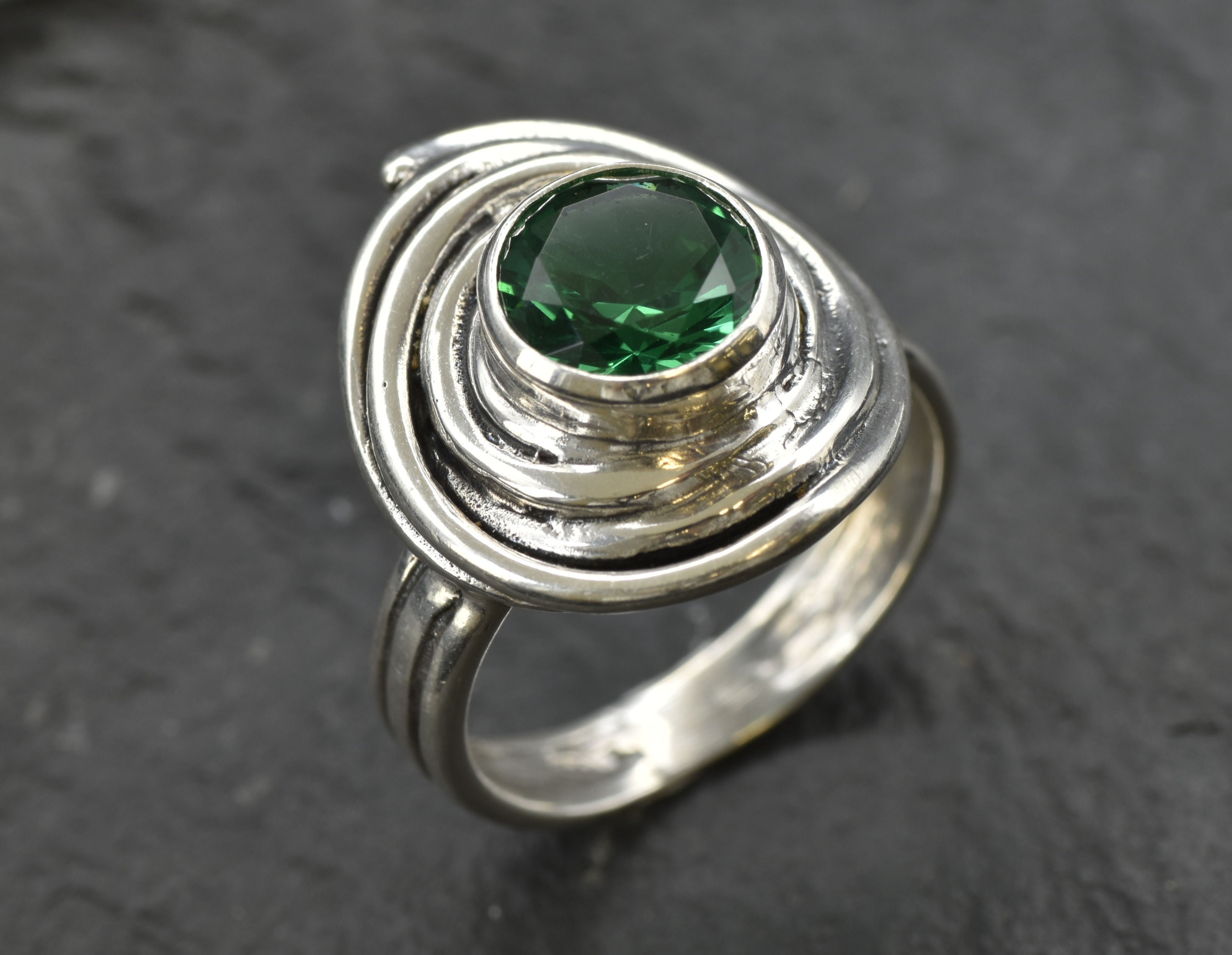 Charming 925 Sterling Silver ring with a bezel-set Created Green Emerald, a lovely May birthstone gift for any occasion.