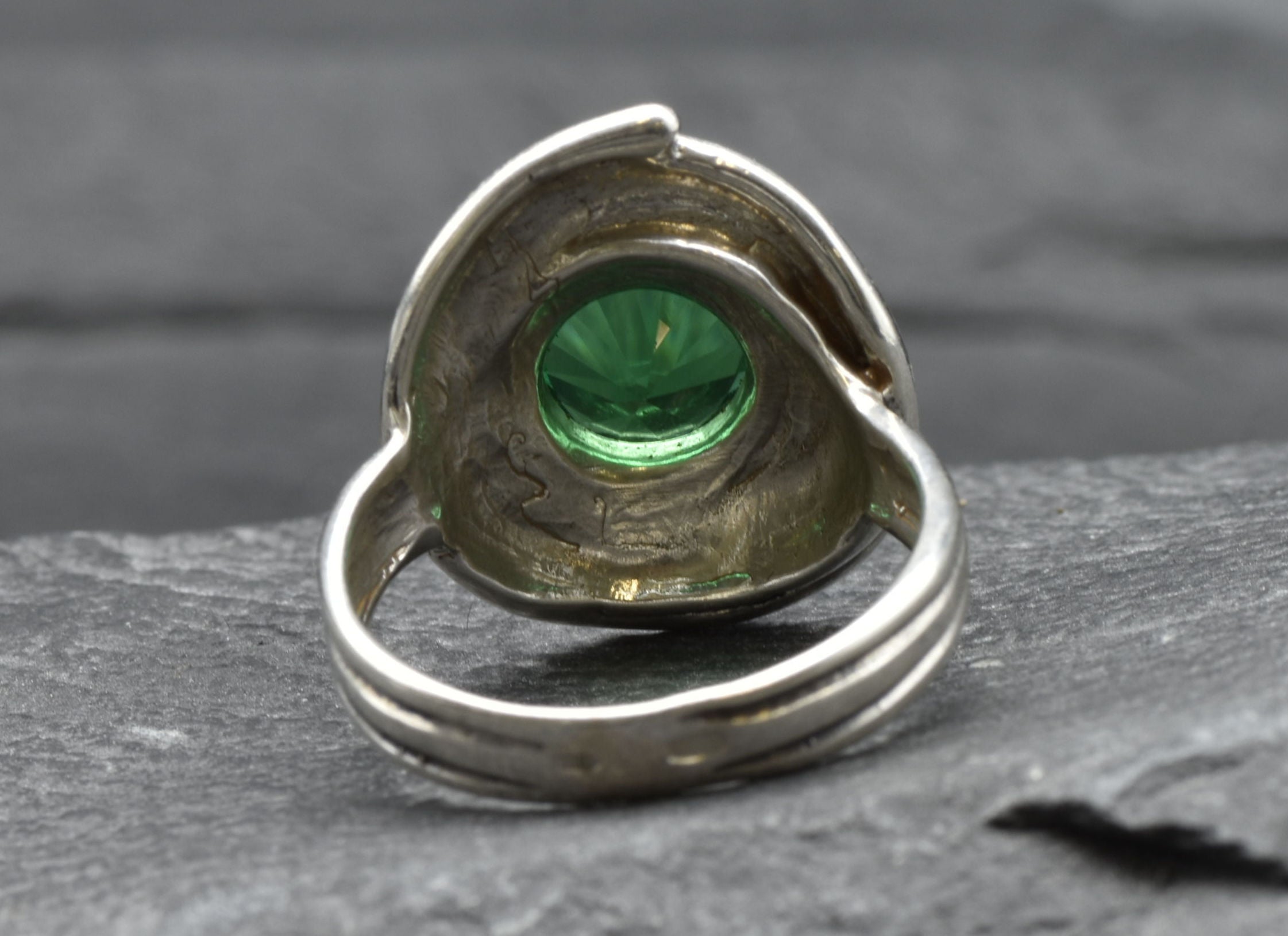 Dazzling 925 Sterling Silver ring with a round Created Green Emerald, perfect for everyday elegance and meaningful celebrations.