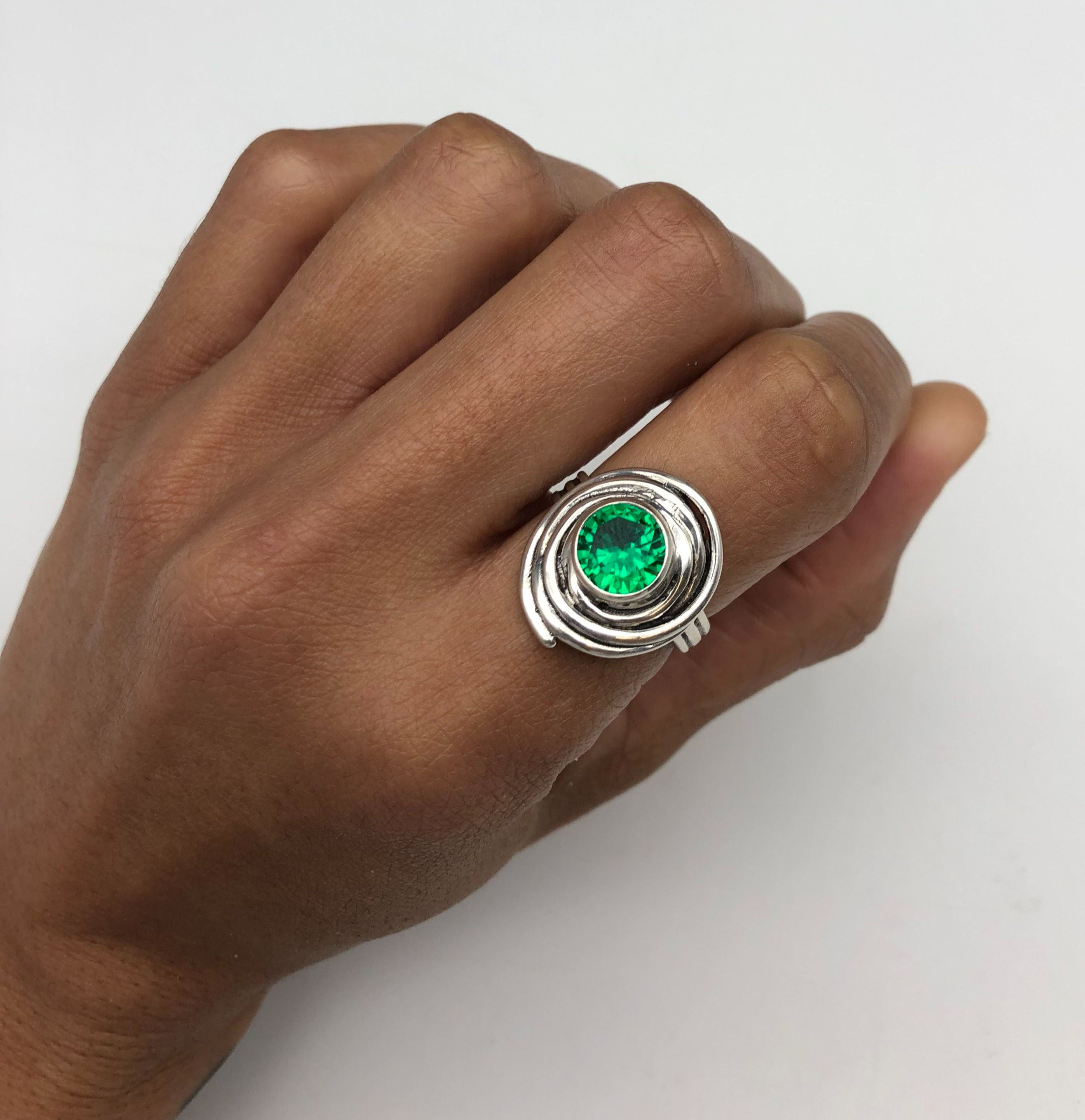 Elegant 925 Sterling Silver ring featuring a round Created Green Emerald, perfect for May birthdays and special occasions.