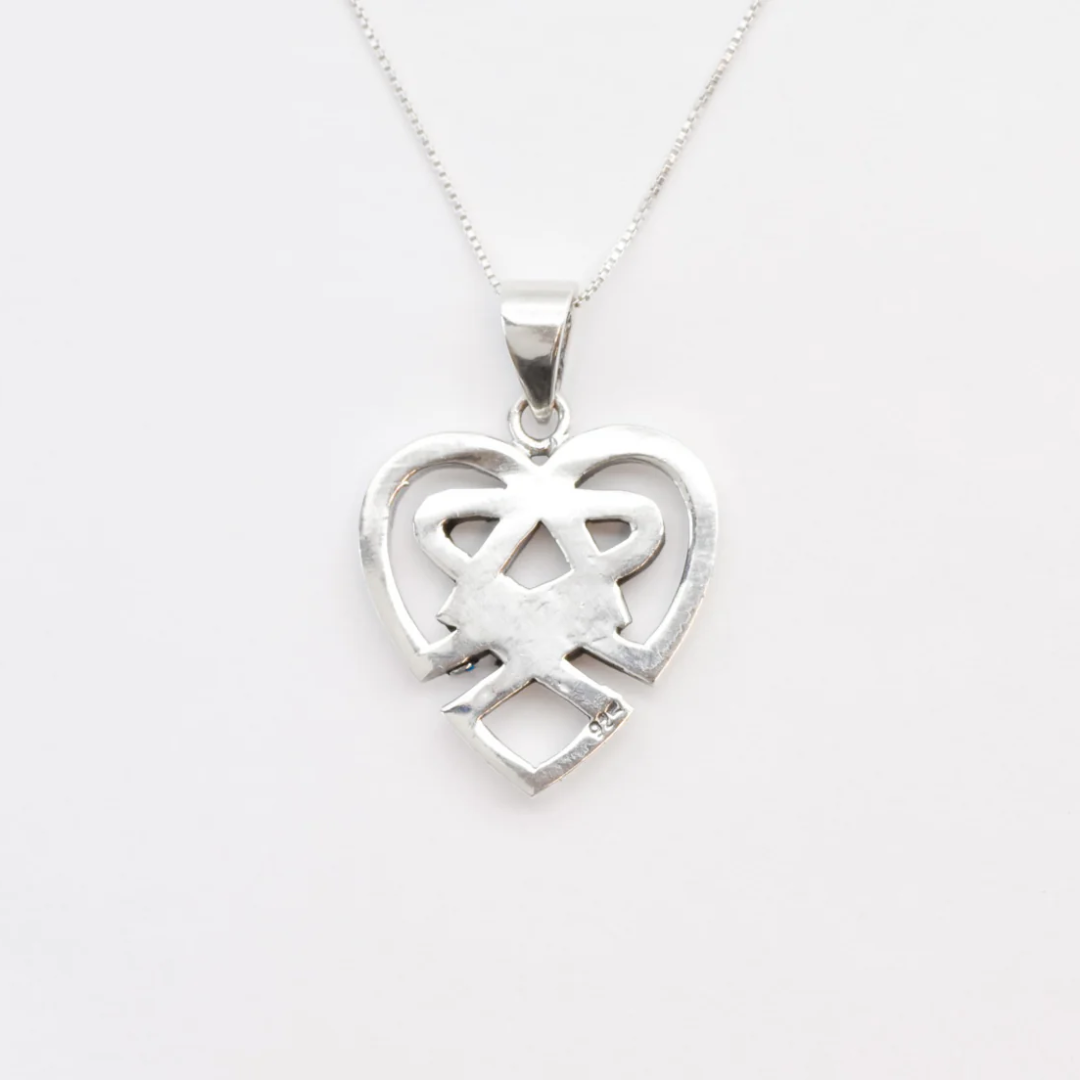 Tribal Heart Pendant on display - A stunning 925 Sterling Silver necklace that embodies love, ideal for anniversaries and celebrations.