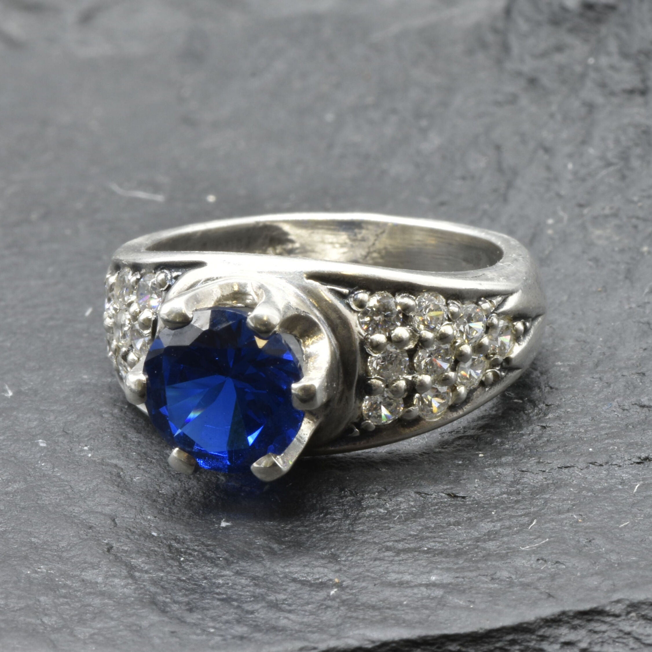 Beautiful 925 Sterling Silver ring with a Round Created Blue Sapphire, symbolizes loyalty and is perfect for any occasion.