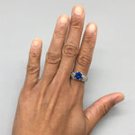 Sleek 925 Sterling Silver ring accented with a Round Created Blue Sapphire, a stylish choice for everyday elegance and gifting.