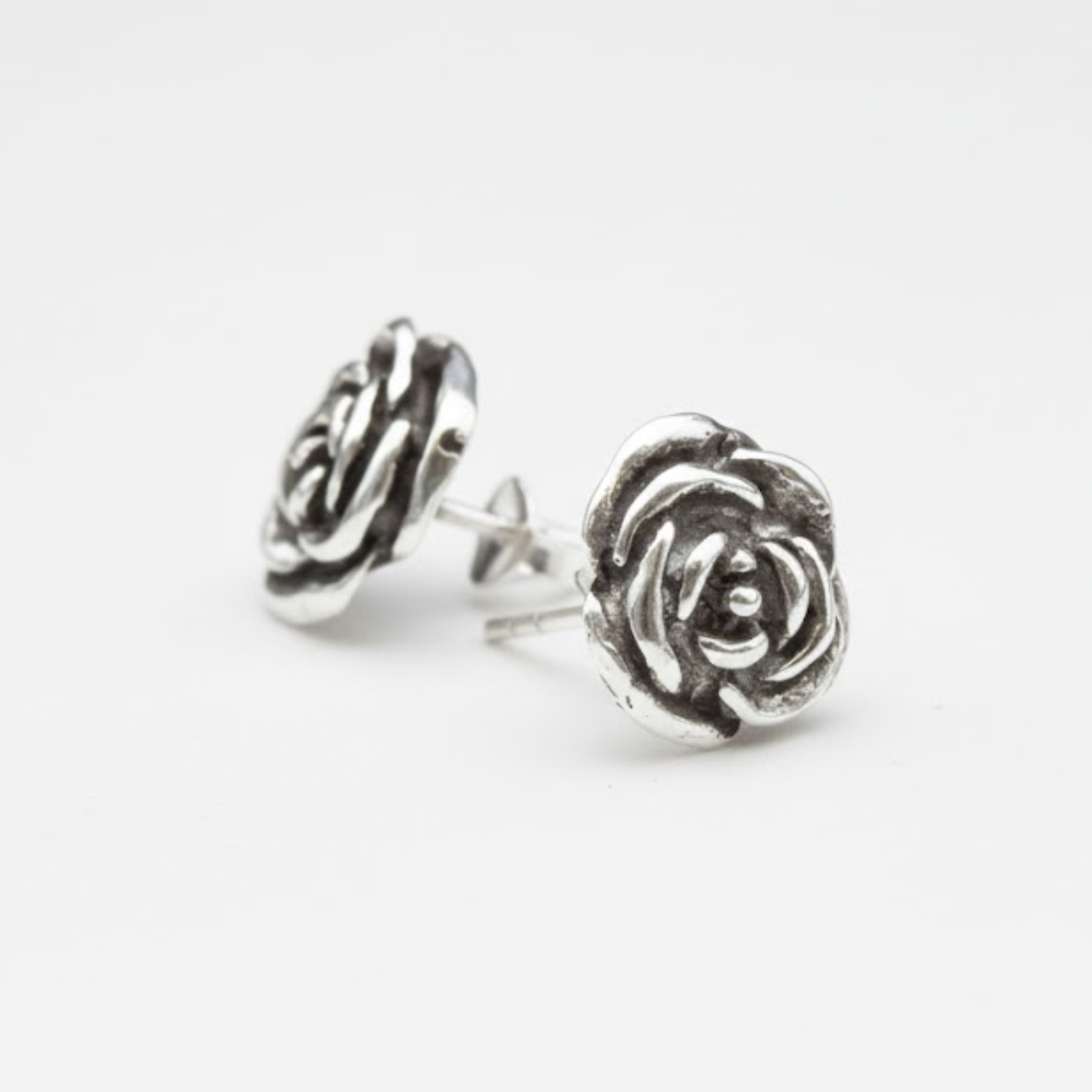 Dainty Silver Flower Studs - Graceful rose earrings in 925 Sterling Silver, perfect for casual wear and memorable gift giving.