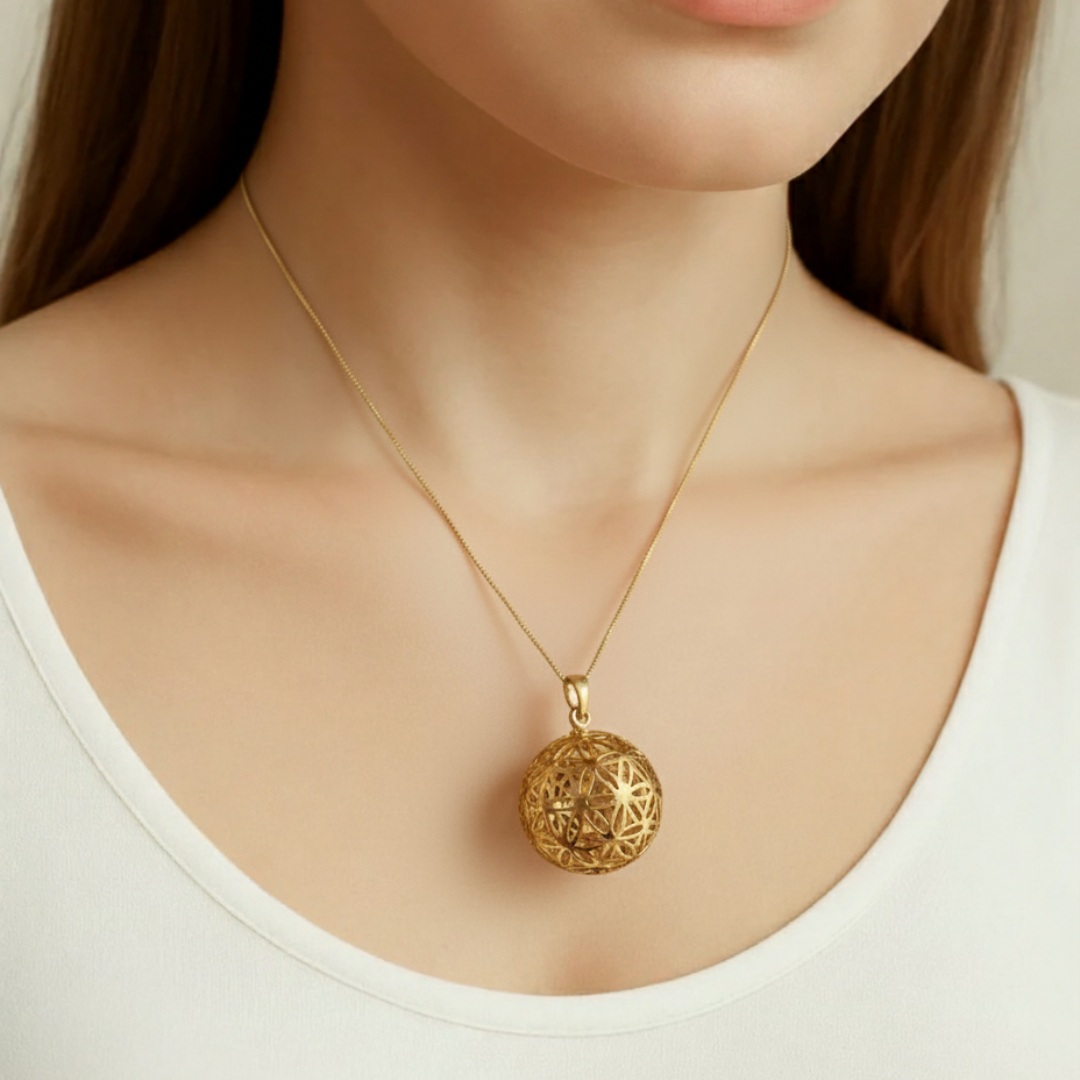 Unique Gold Sphere Pendant with the Flower of Life design in 18k Gold Vermeil, perfect for stylish everyday wear and special gifts.