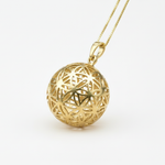 Radiant Gold Sphere Pendant with exquisite Flower of Life pattern, crafted in 18k Gold Vermeil for versatile styling and gifting.