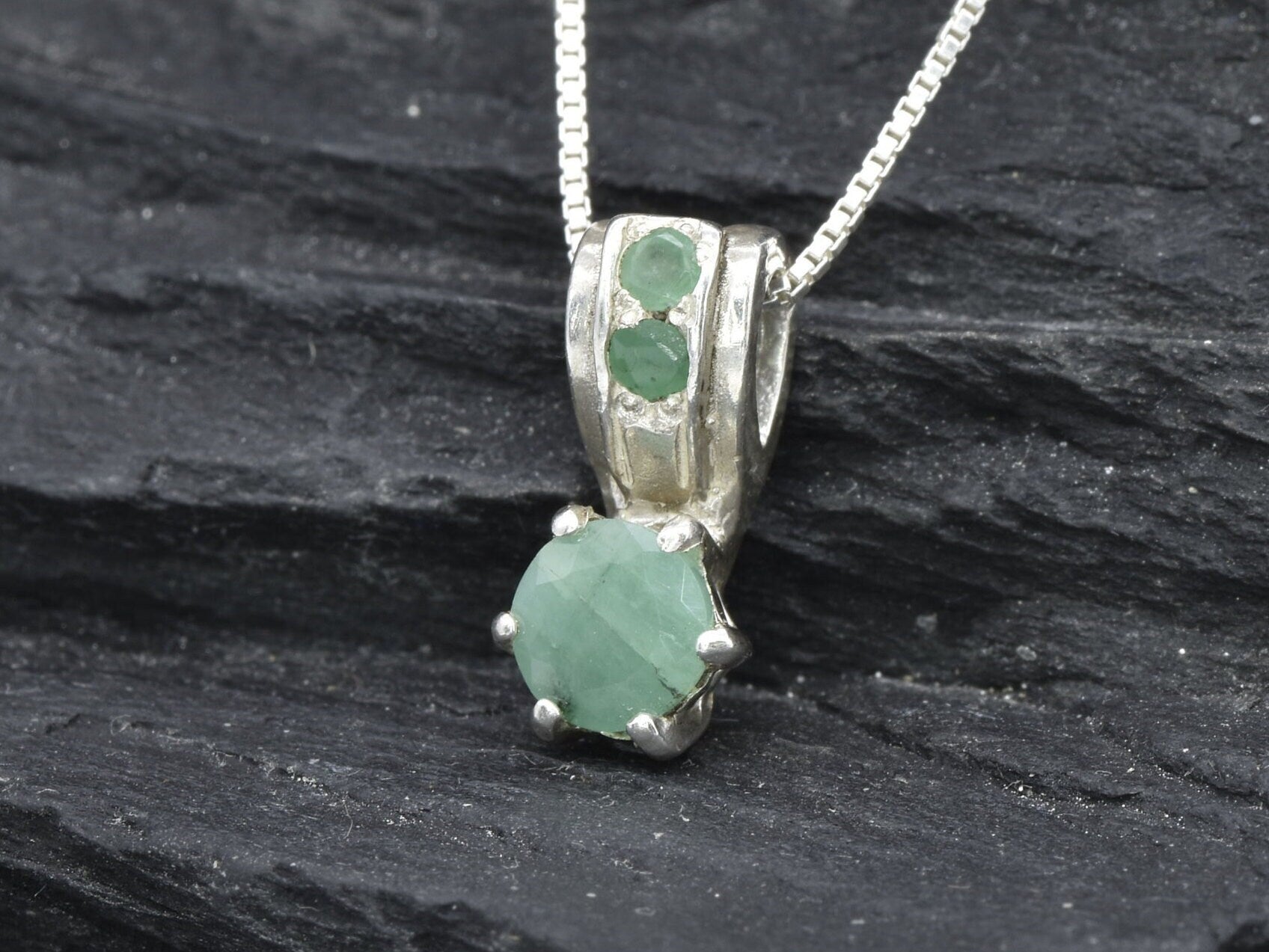 Elegant natural emerald pendant in sterling silver, perfect for daily wear and meaningful May birthday gifts.