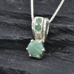 Elegant natural emerald pendant in sterling silver, perfect for daily wear and meaningful May birthday gifts.