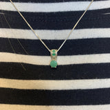 Stunning 925 silver emerald pendant with vibrant green gemstone, perfect for celebrating birthdays and meaningful moments.
