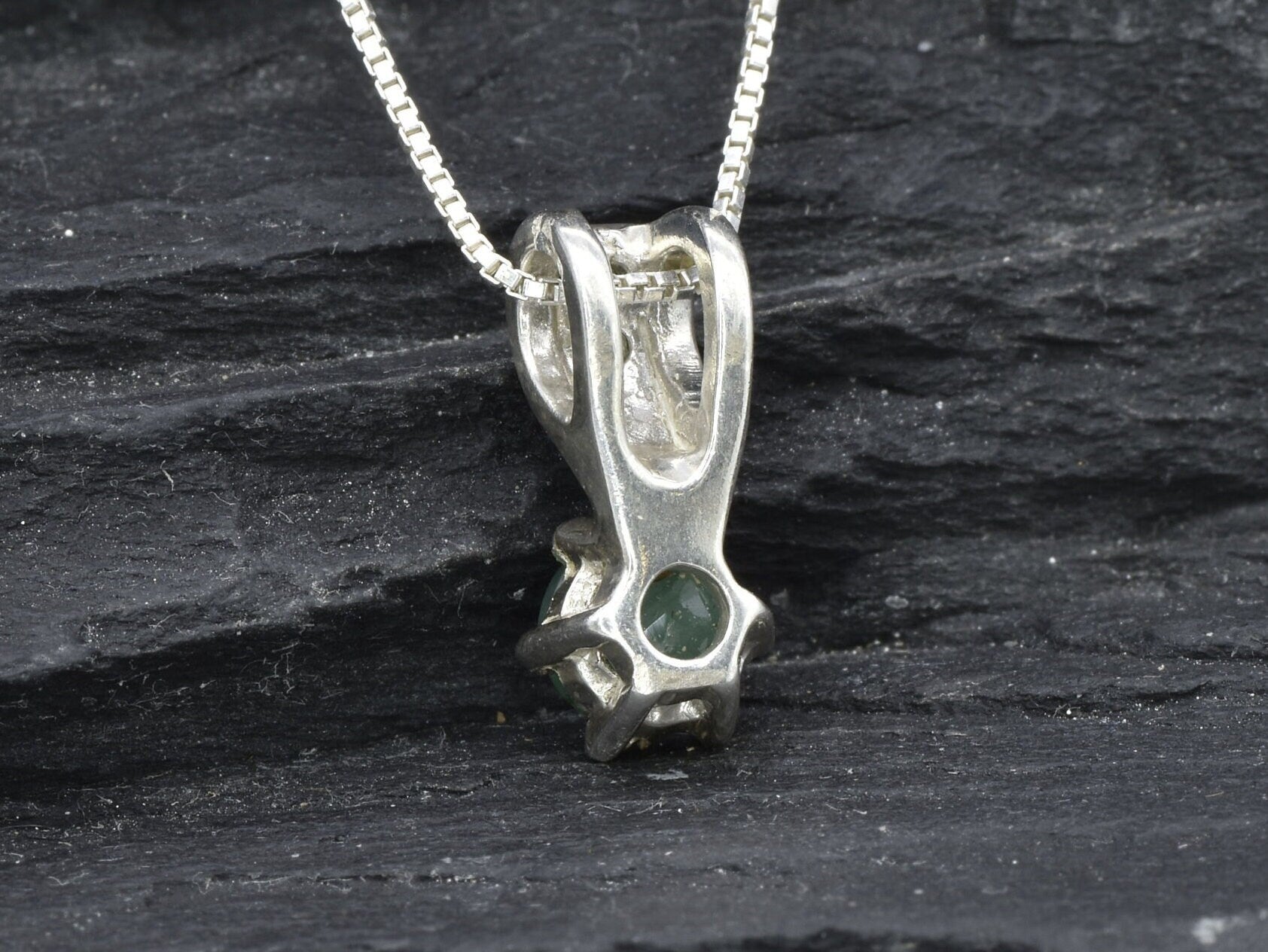 Charming emerald pendant in 925 sterling silver, features a vibrant green stone, a delightful gift for May birthdays and special events.