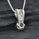 Charming emerald pendant in 925 sterling silver, features a vibrant green stone, a delightful gift for May birthdays and special events.