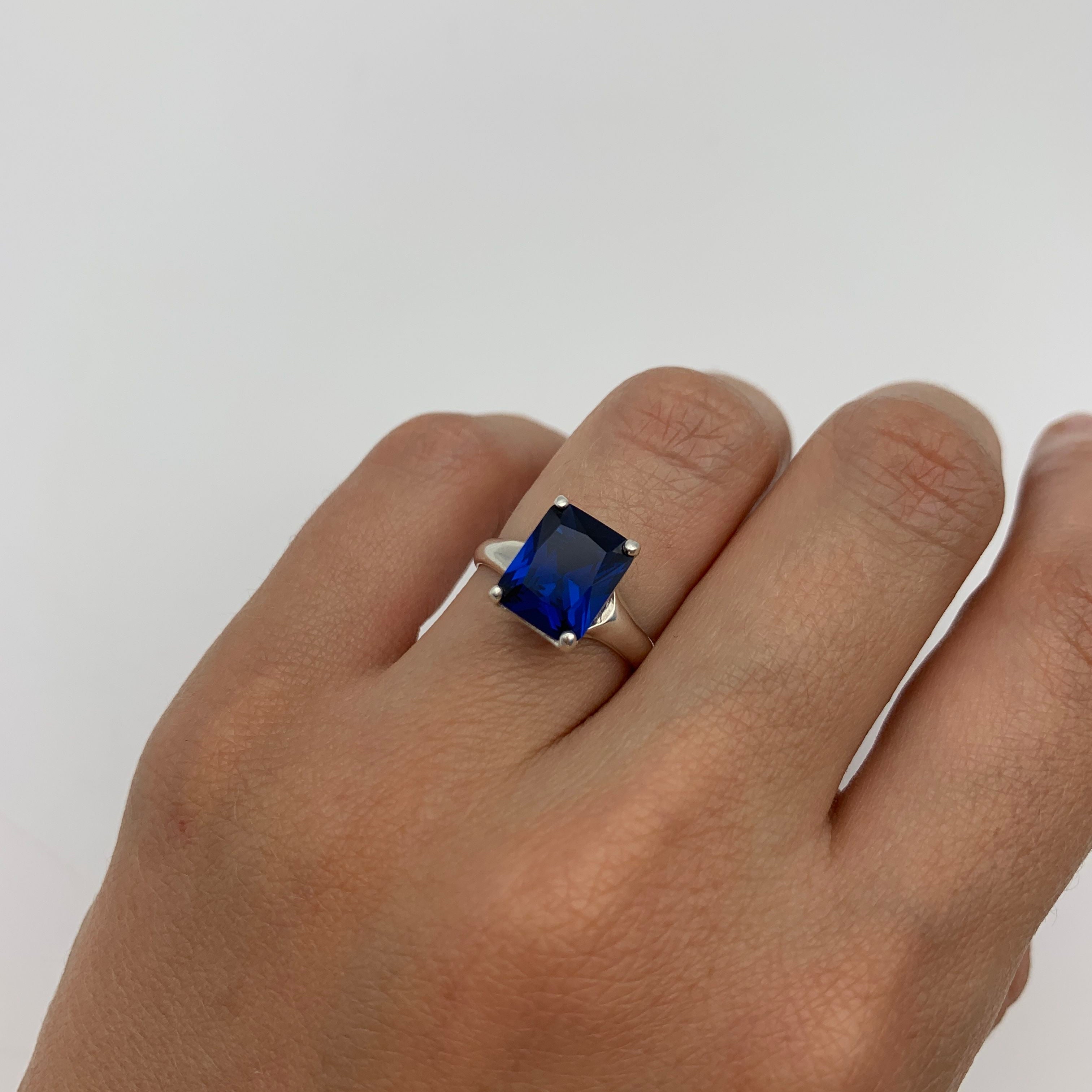 Elegant 925 Sterling Silver Sapphire Ring with Baguette Blue Sapphire; perfect September birthday gift and symbol of faithfulness.
