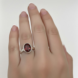 Elegant 925 Sterling Silver Ring with Oval Created Ruby, symbolizes passion and nobility, perfect for everyday elegance.