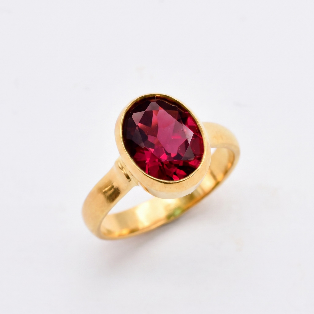 Created Ruby Ring made in 18k Gold Vermeil with Oval Created Red Ruby in Bezel setting, July Birthstone gift idea, symbolizes nobility, purity, and passion, ideal for everyday wear and perfect for birthday gifting and special occasions.
