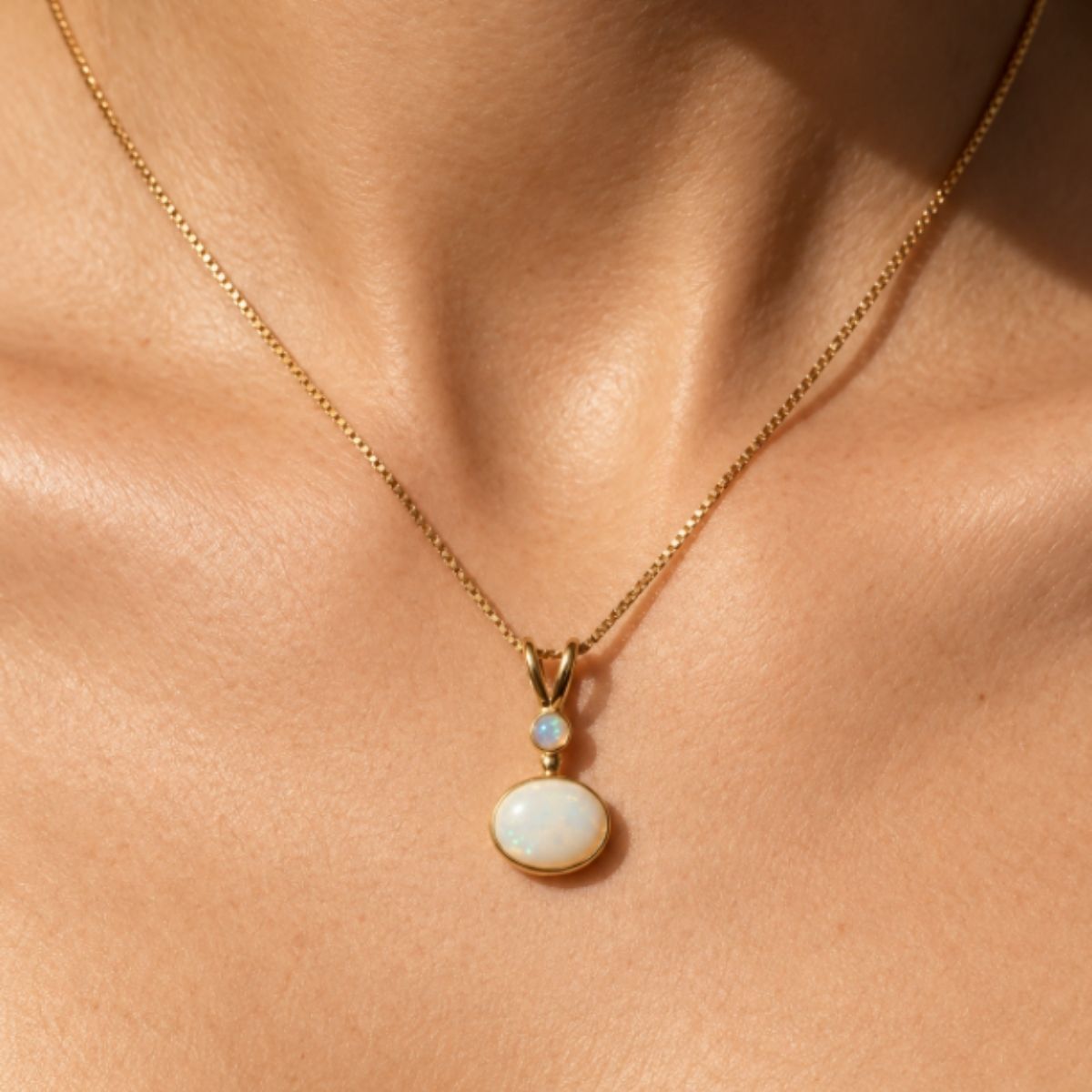 Charming 18k Gold Vermeil Opal Pendant with white Australian opal, a symbol of truth—ideal for special occasions and everyday wear.