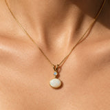 Charming 18k Gold Vermeil Opal Pendant with white Australian opal, a symbol of truth—ideal for special occasions and everyday wear.