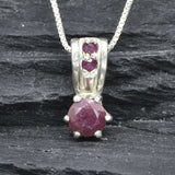 Charming 925 Sterling Silver pendant with a red ruby, ideal for July birthdays and a timeless accessory for any occasion.