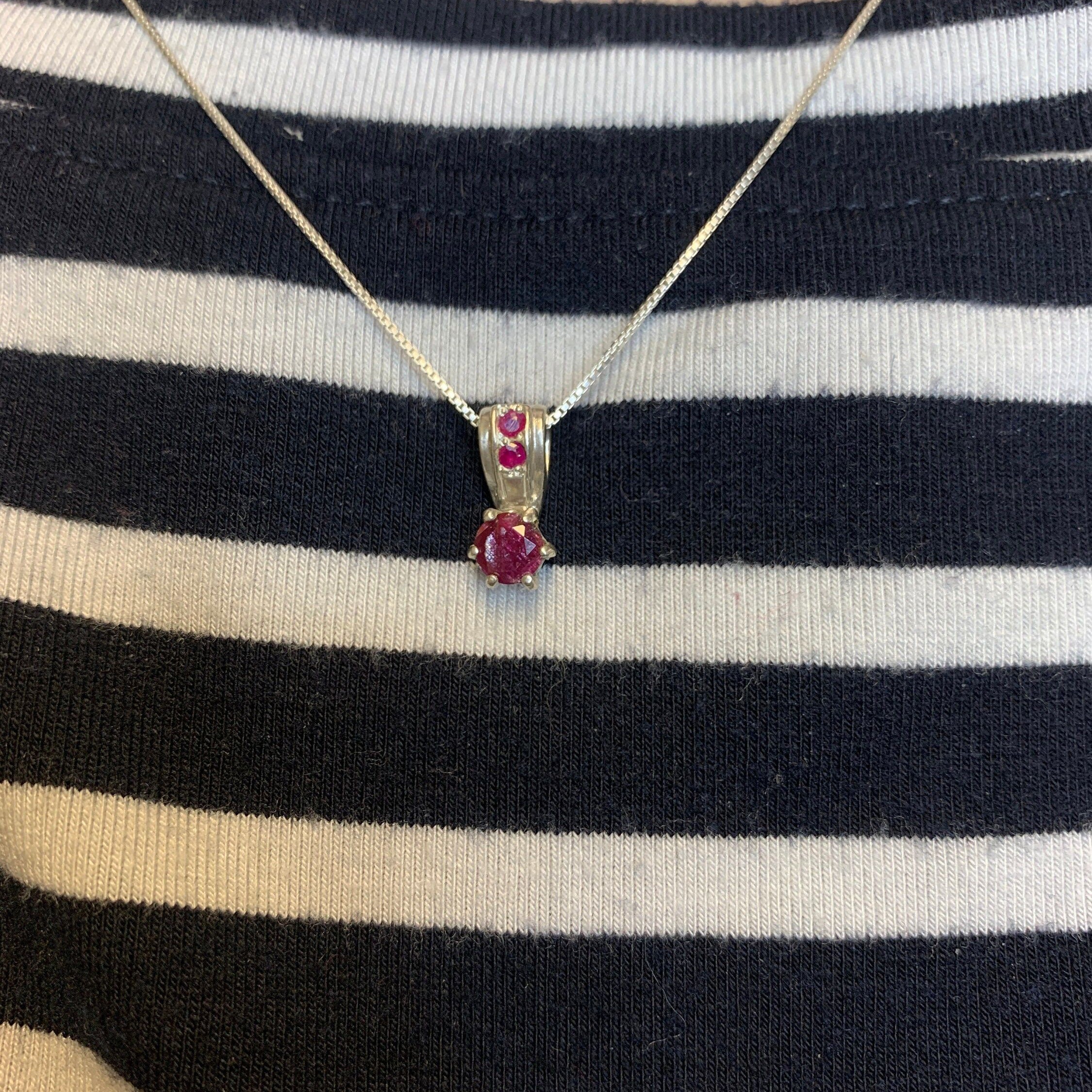 Elegant 925 Sterling Silver Ruby Pendant in prong setting, featuring a vibrant natural red ruby, ideal for birthdays and special occasions.
