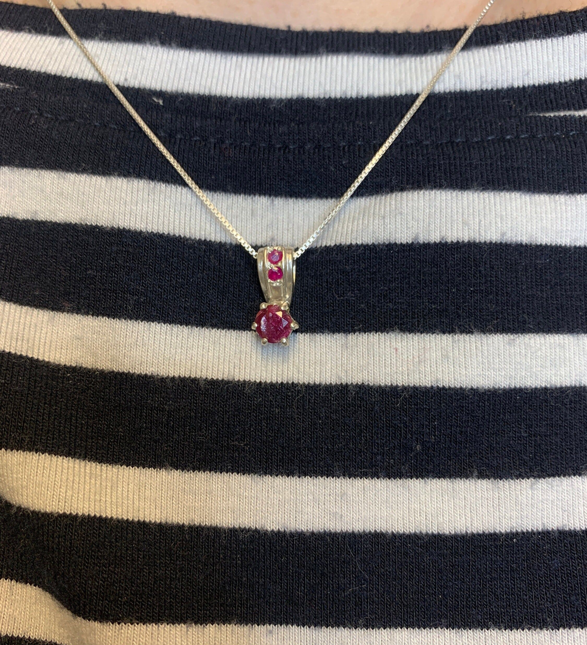 Elegant 925 Sterling Silver Ruby Pendant in prong setting, featuring a vibrant natural red ruby, ideal for birthdays and special occasions.