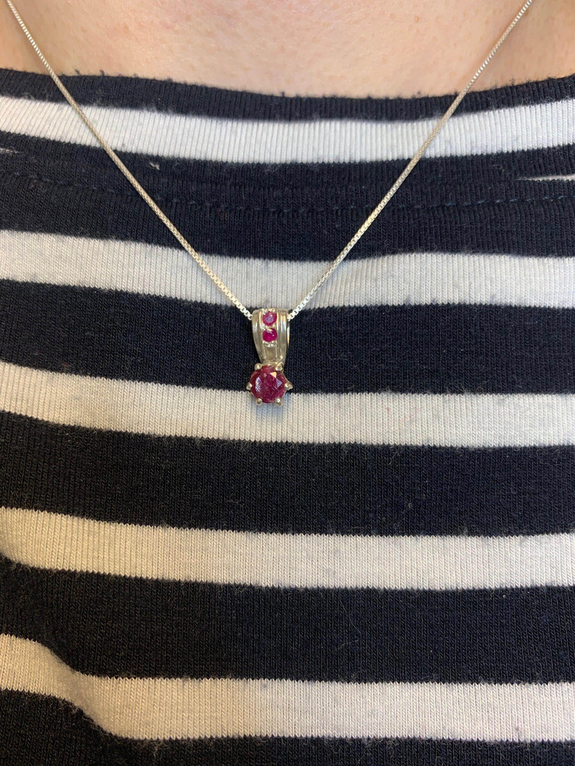 Elegant 925 Sterling Silver Ruby Pendant in prong setting, featuring a vibrant natural red ruby, ideal for birthdays and special occasions.
