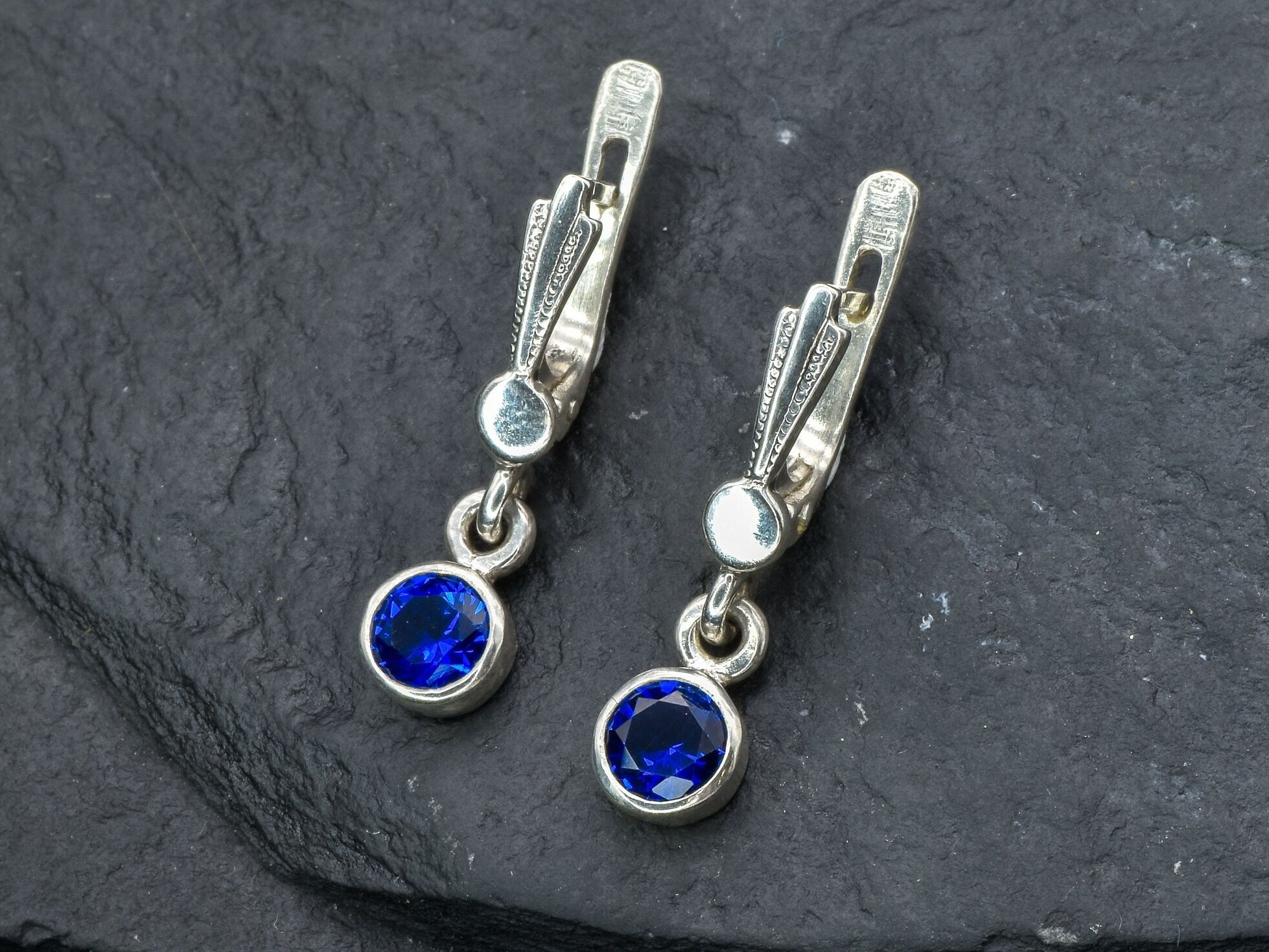 Created Sapphire Earrings made in 925 Sterling Silver with Round Created Blue Sapphire in Bezel setting, September Birthstone gift idea, symbolizes sincerity, truth, and faithfulness, ideal for everyday wear and perfect for birthday gifting and special occasions.