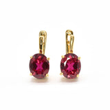 Created Ruby Earrings made in 18k Gold Vermeil with Oval Created Red Ruby in Prong setting, July Birthstone gift idea, symbolizes nobility, purity, and passion, ideal for everyday wear and perfect for birthday gifting and special occasions.