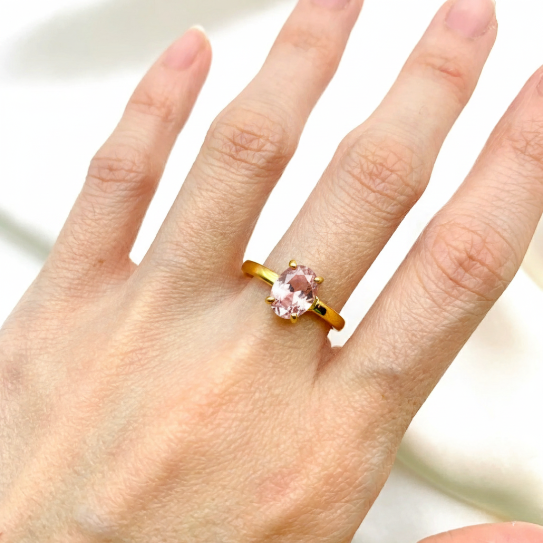 Radiant pink oval morganite solitaire ring in 18k Gold Vermeil, perfect for adding a touch of elegance to any outfit.