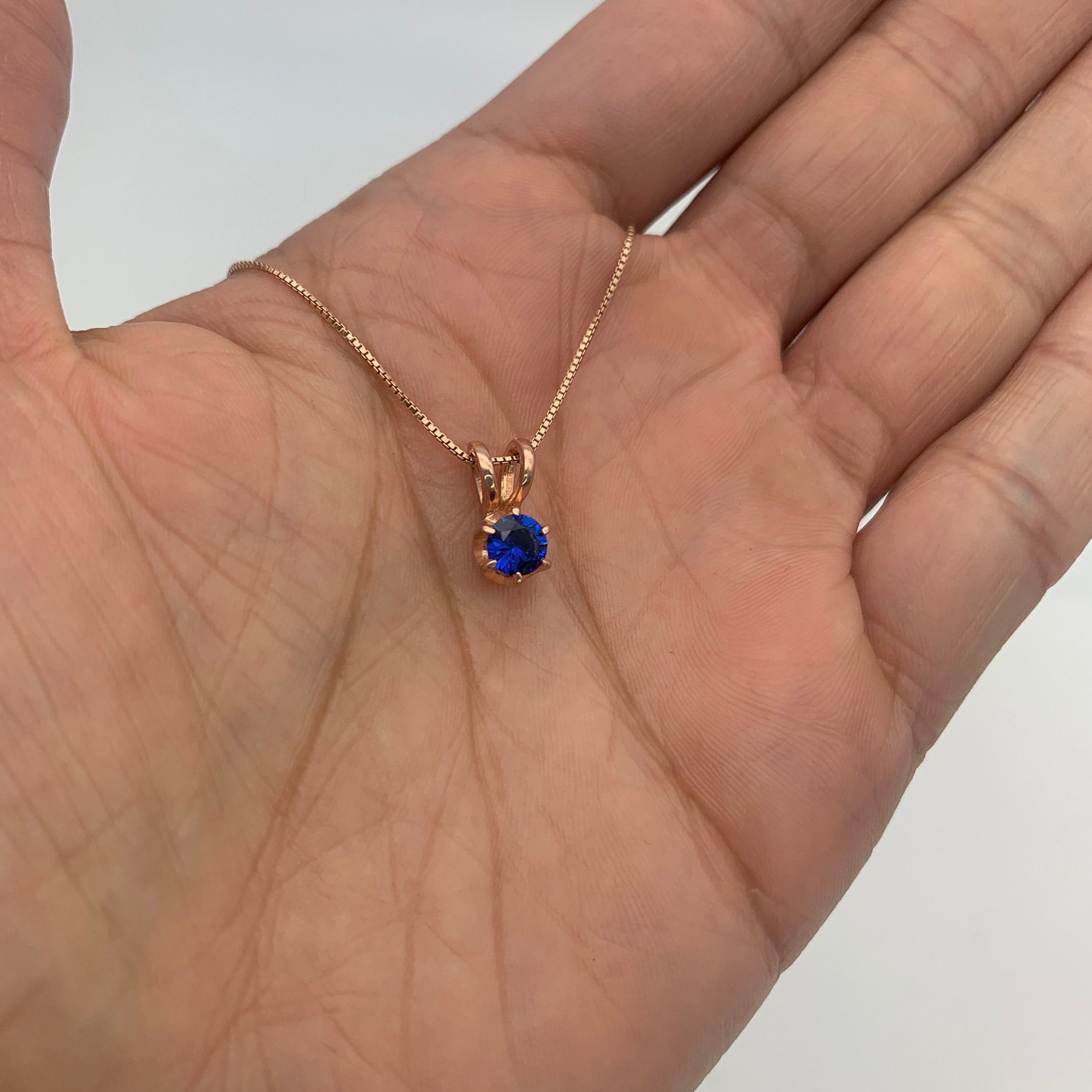 Rose Gold Vermeil Sapphire Pendant featuring a Round Created Blue Sapphire, perfect for September birthdays and daily wear.