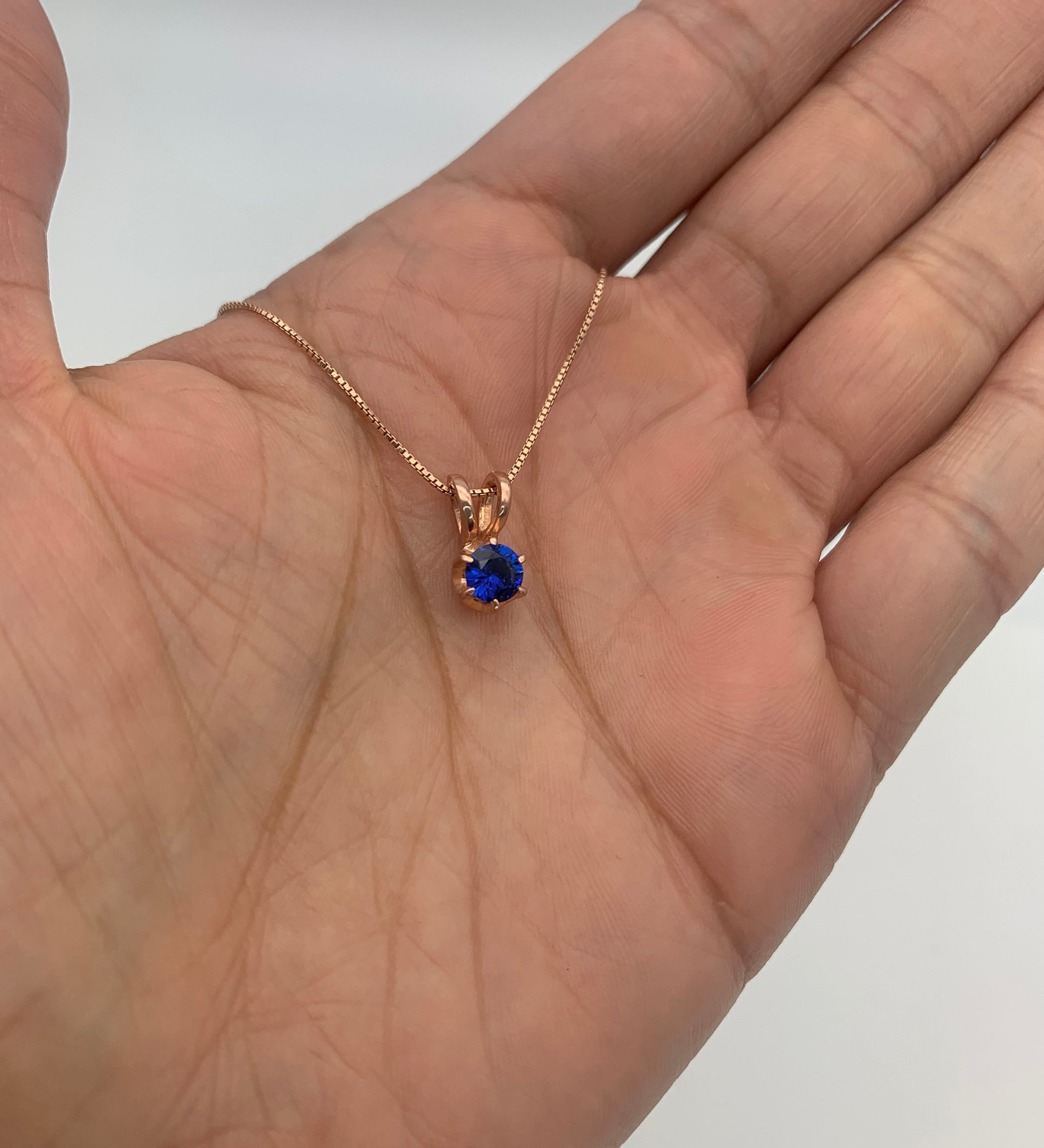 Rose Gold Vermeil Sapphire Pendant featuring a Round Created Blue Sapphire, perfect for September birthdays and daily wear.