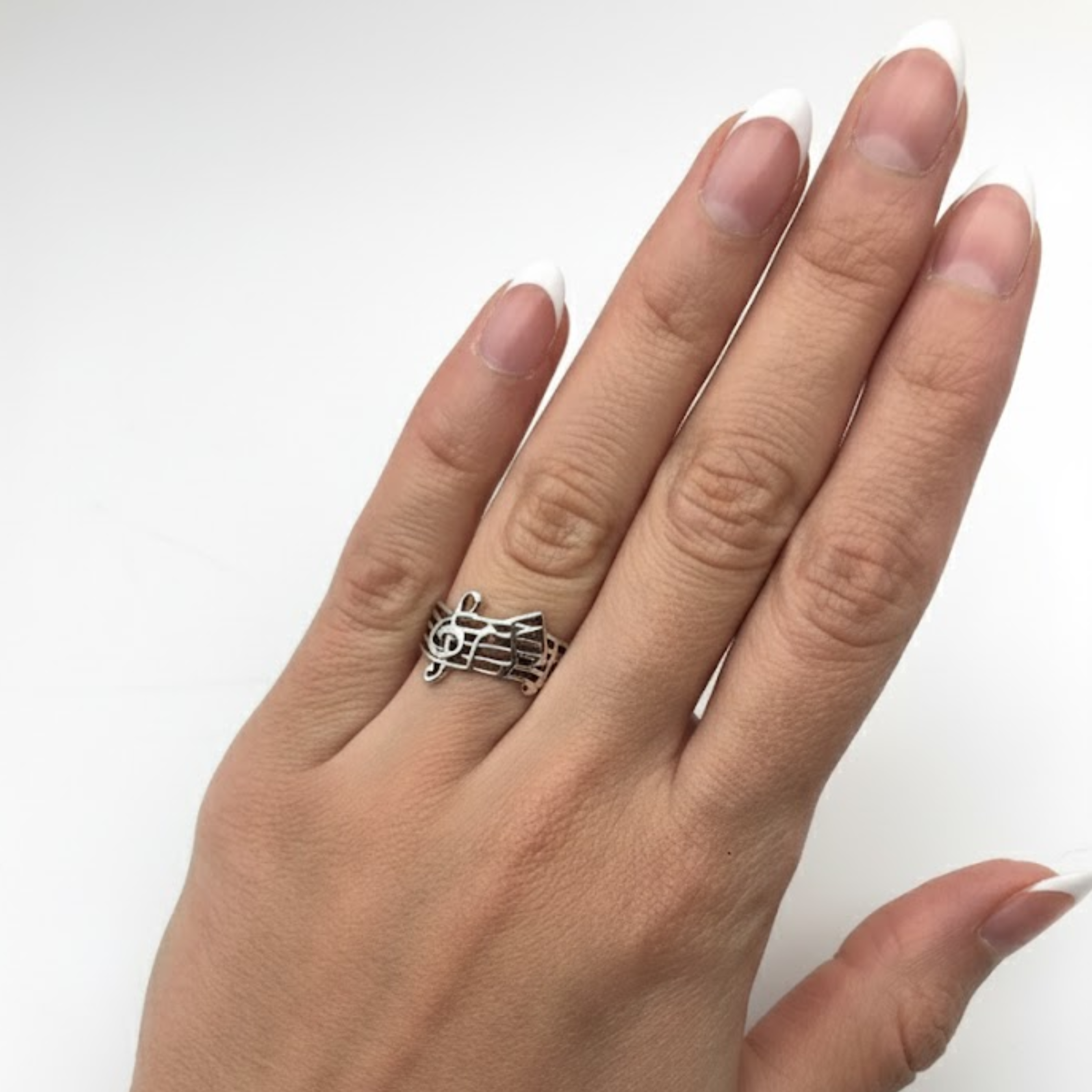 Unique Silver Music Note Ring in 925 Sterling Silver, a perfect accessory for music lovers and special celebrations.