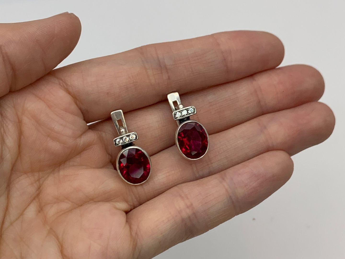 Elegant Ruby Earrings in 925 Sterling Silver, featuring a striking Oval Created Ruby, perfect for July birthdays and special gifts.