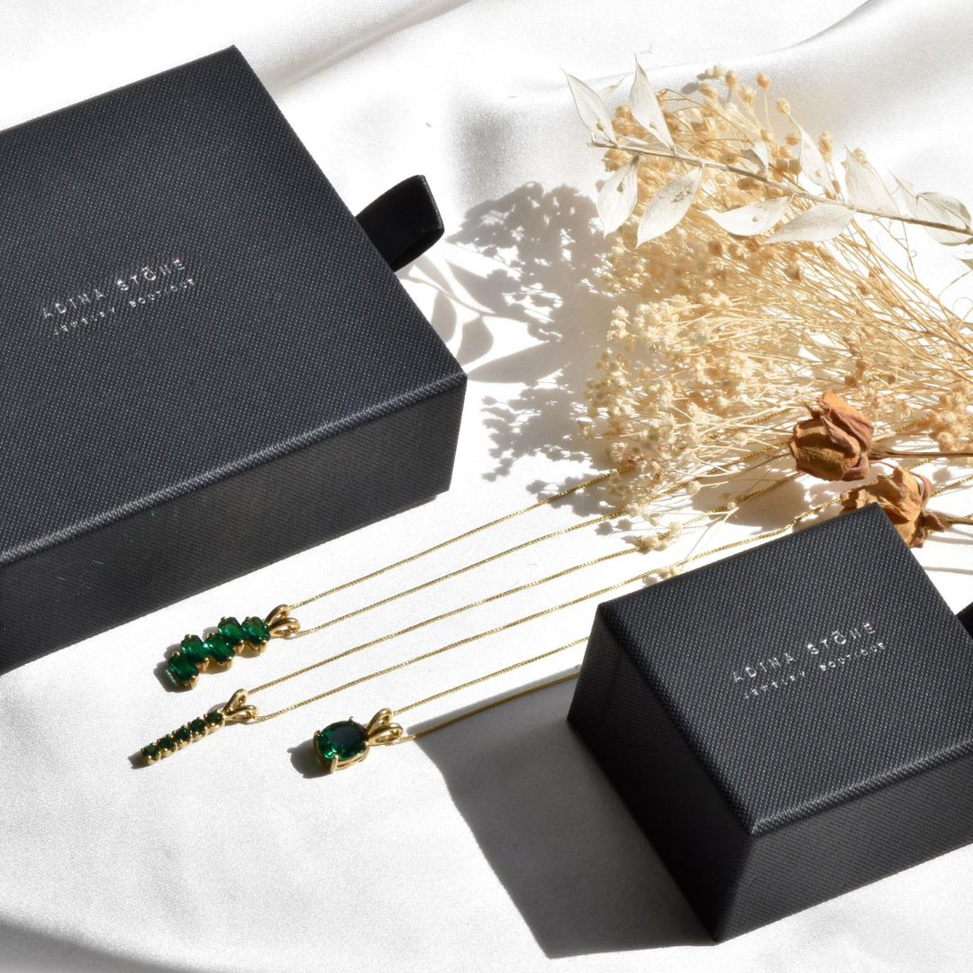 18k gold vermeil peridot pendant resting in gift box, round green birthstone ideal for August birthdays