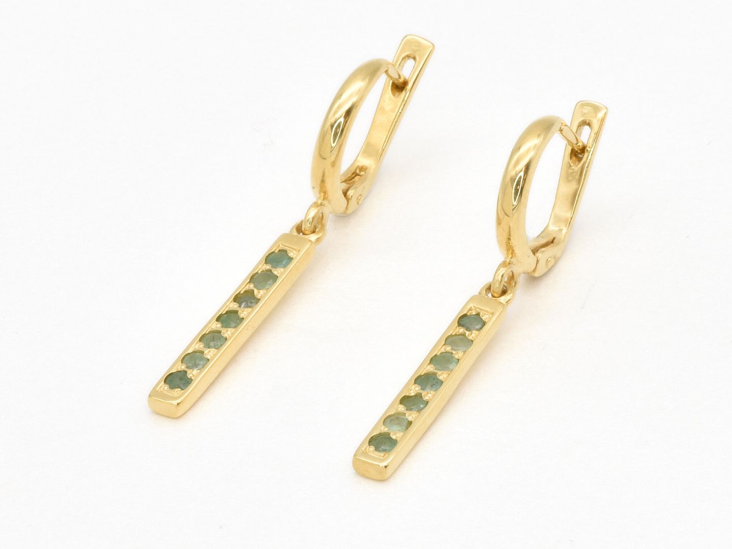 Chic 18k Gold Vermeil Earrings featuring Round Natural Emeralds, symbolizing growth and harmony, ideal for special occasions.