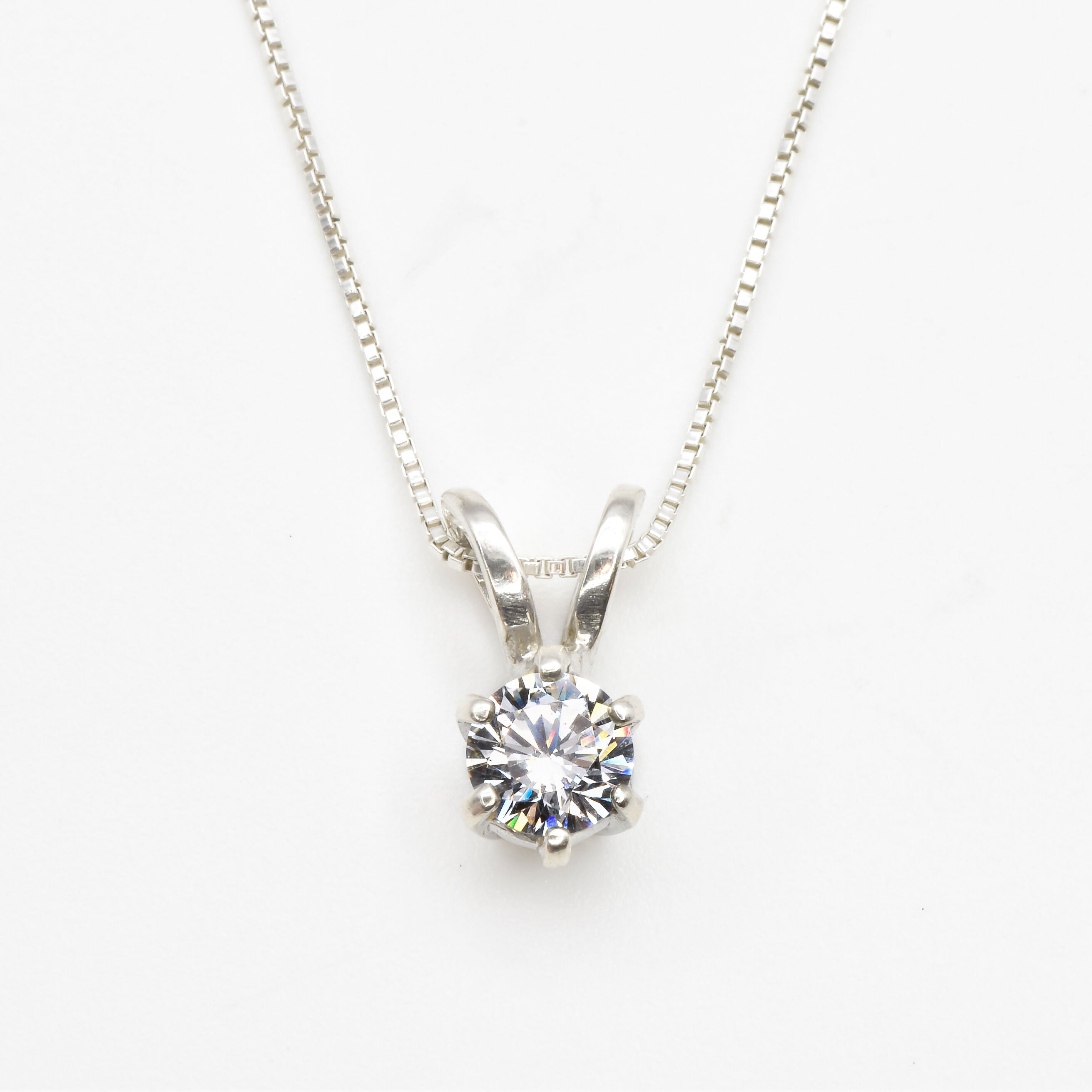 Created CZ Pendant made in 925 Sterling Silver with Round Created White CZ in Solitaire setting, April Birthstone gift idea, symbolizes, ideal for everyday wear and perfect for birthday gifting and special occasions.