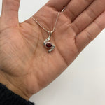 Beautiful 925 Sterling Silver Ruby Pendant with Oval Created Red Ruby, a timeless accessory for any occasion.