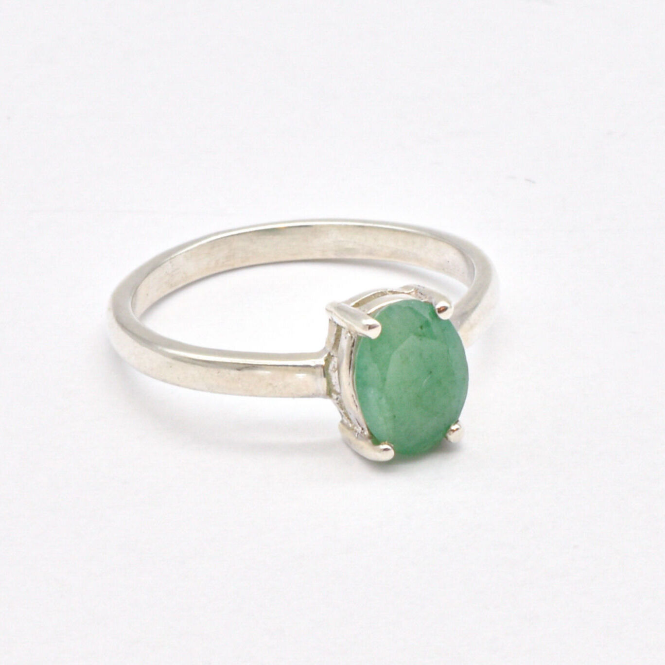Beautiful 925 Sterling Silver Ring set with a captivating Oval Natural Emerald, embodying peace and perfect for any celebration.